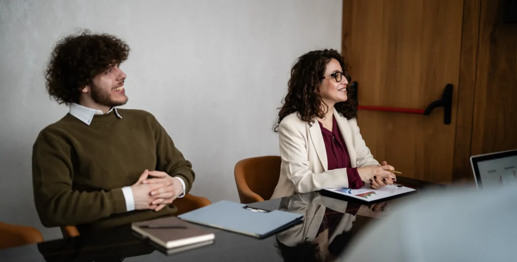 Diverse business people discussing ideas and sharing insights during a professional corporate meeting in an office setting